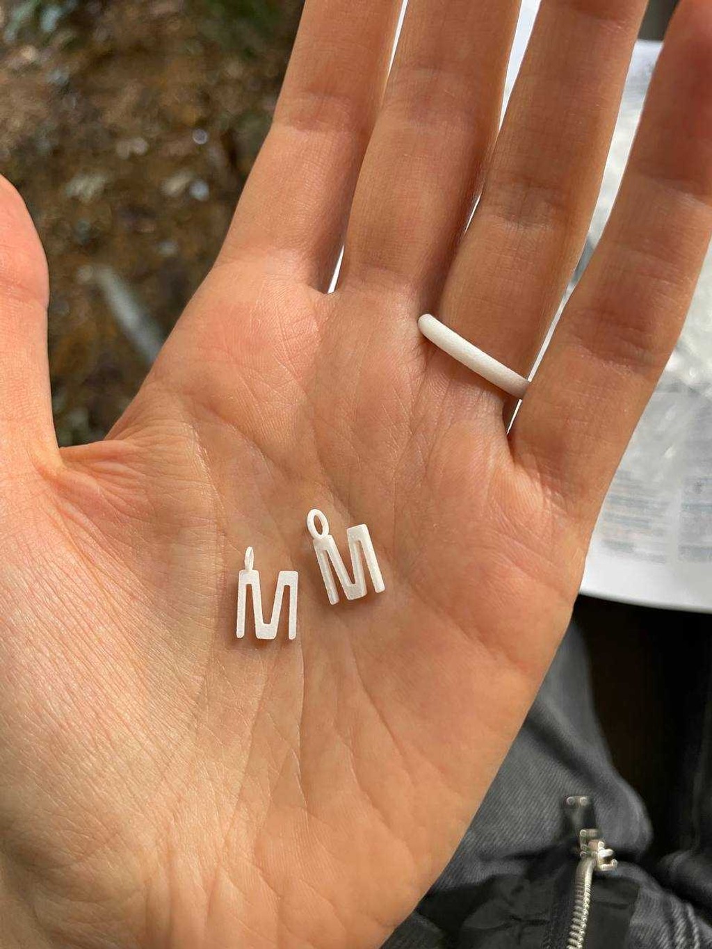 Dinamo Typefaces Font In Use Asfalt Migle Jewelery Silver Charms 1